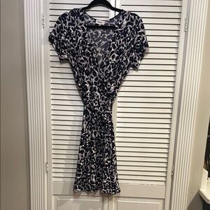 Navy and lavender faux wrap knit dress.